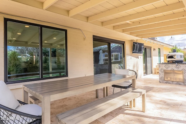 view of patio with outdoor dining space