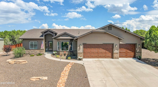 view of front of property featuring a garage