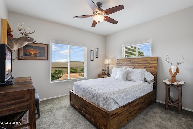 carpeted bedroom featuring ceiling fan