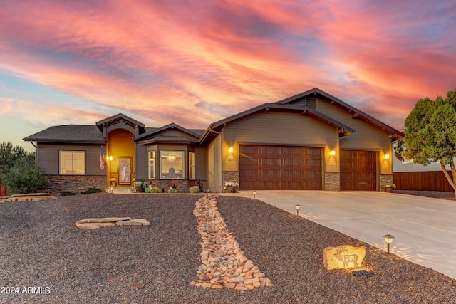 craftsman inspired home with a garage