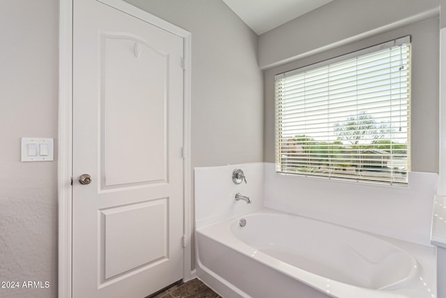 bathroom featuring a bath