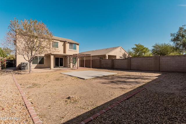 back of house featuring a patio