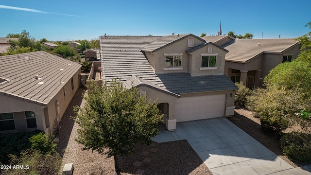 front of property featuring a garage