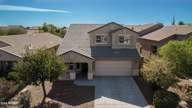 view of front of property with a garage