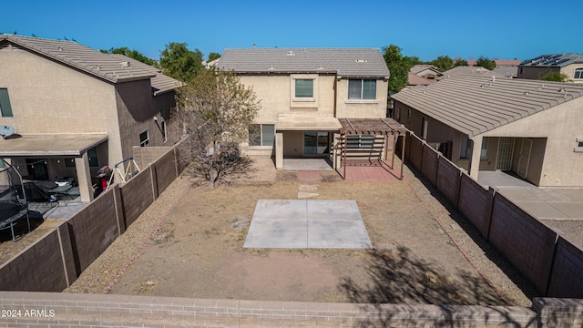 back of house featuring a patio