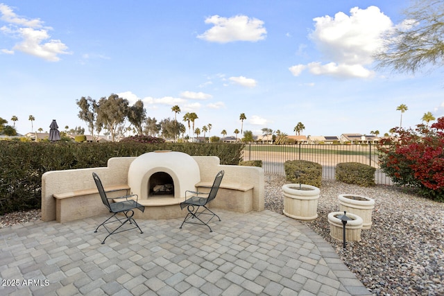 view of patio / terrace with a fireplace