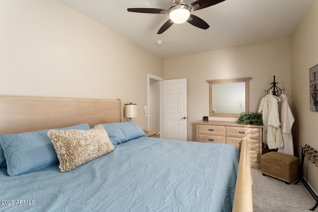 bedroom featuring ceiling fan and light carpet