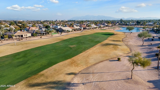 aerial view featuring a water and mountain view