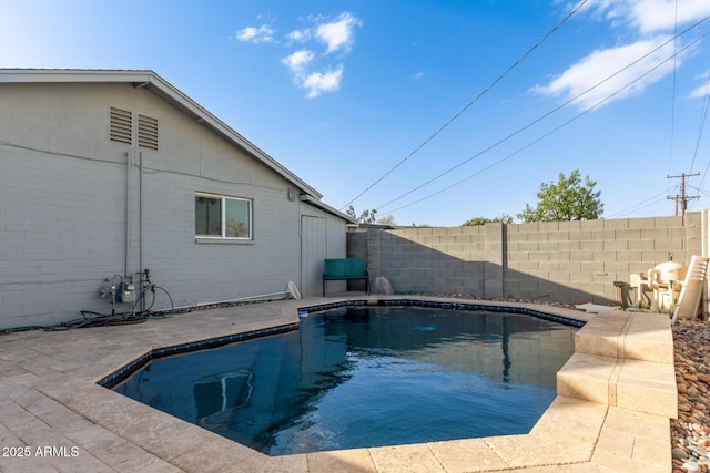 view of pool with a patio, a fenced backyard, and a fenced in pool