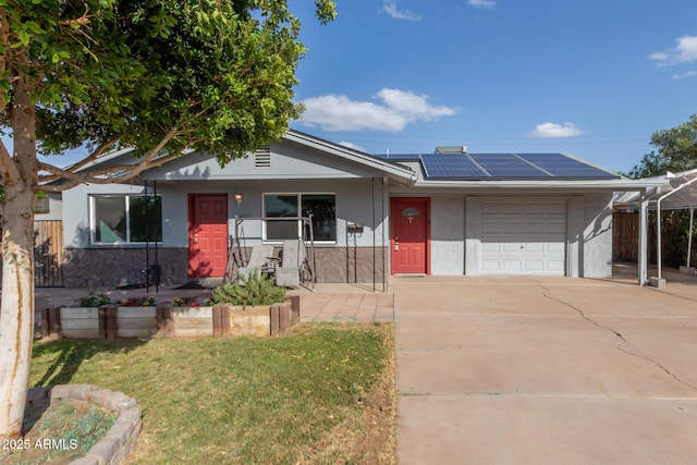 single story home featuring stucco siding, covered porch, concrete driveway, roof mounted solar panels, and a garage