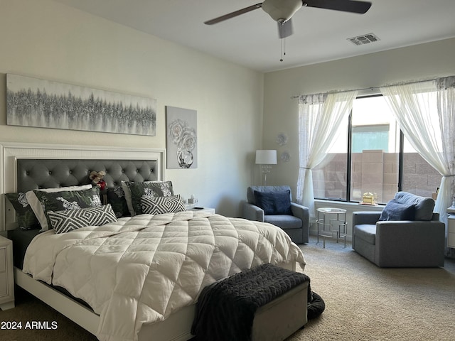 bedroom featuring ceiling fan and carpet floors