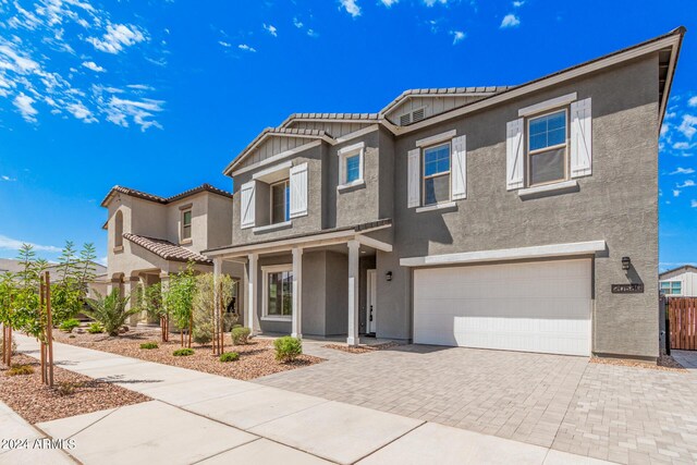 view of front of property featuring a garage