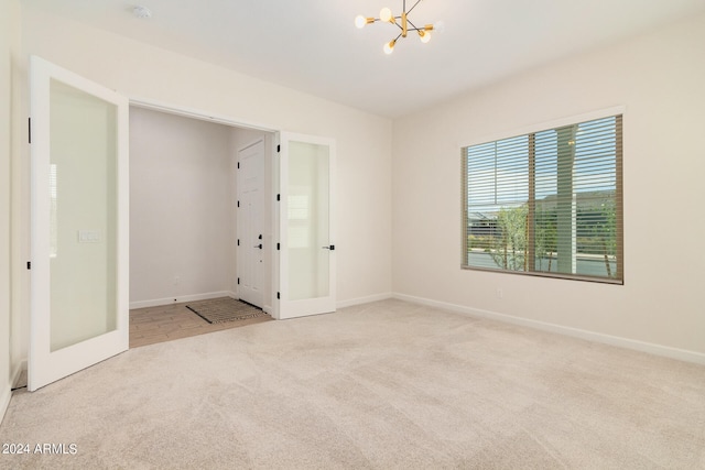 interior space with a notable chandelier