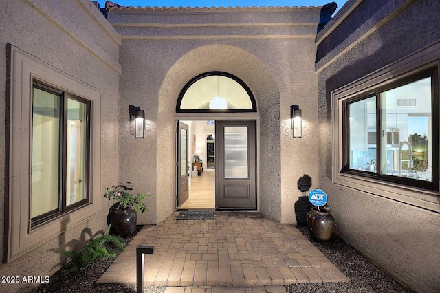7596 N Via De La Siesta, Scottsdale, AZ 85258 - property entrance featuring stucco siding and a patio