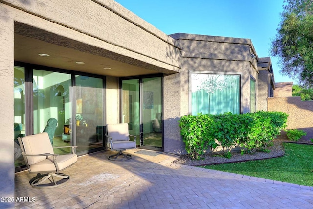 7596 N Via De La Siesta, Scottsdale, AZ 85258 - property entrance with stucco siding and a patio