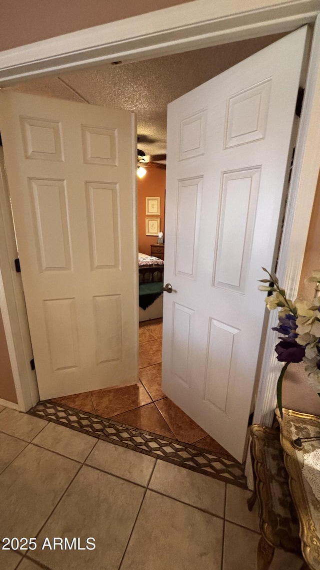 1440 N Idaho Rd Unit 1022, Apache Junction, AZ 85119 - hall with light tile patterned floors