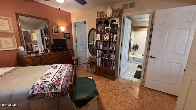 1440 N Idaho Rd Unit 1022, Apache Junction, AZ 85119 - tiled bedroom with ensuite bathroom