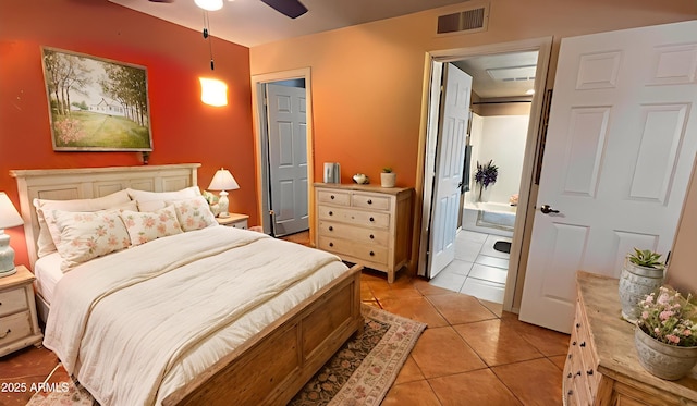 1440 N Idaho Rd Unit 1022, Apache Junction, AZ 85119 - bedroom with light tile patterned floors and ensuite bathroom