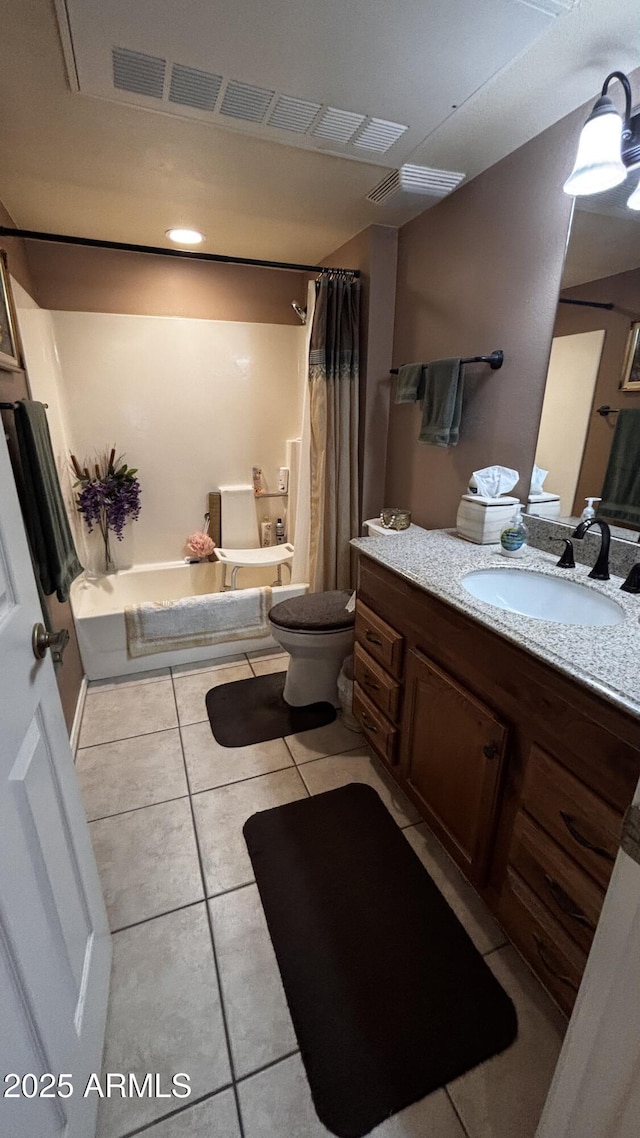 1440 N Idaho Rd Unit 1022, Apache Junction, AZ 85119 - bathroom featuring vanity, toilet, tile patterned floors, and shower / tub combo with curtain