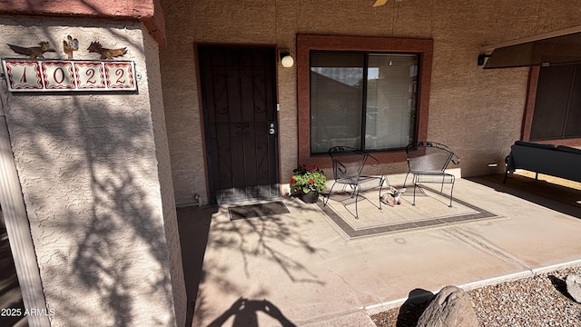 1440 N Idaho Rd Unit 1022, Apache Junction, AZ 85119 - property entrance with stucco siding
