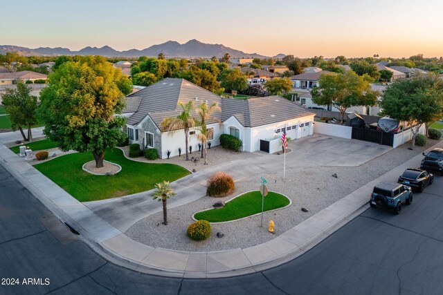 birds eye view of property with a mountain view