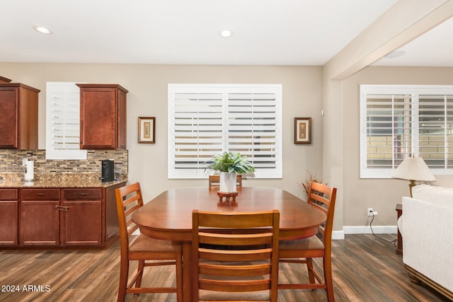 dining room featuring dark hardwood / wood-style flooring