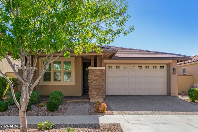 view of front of property featuring a garage