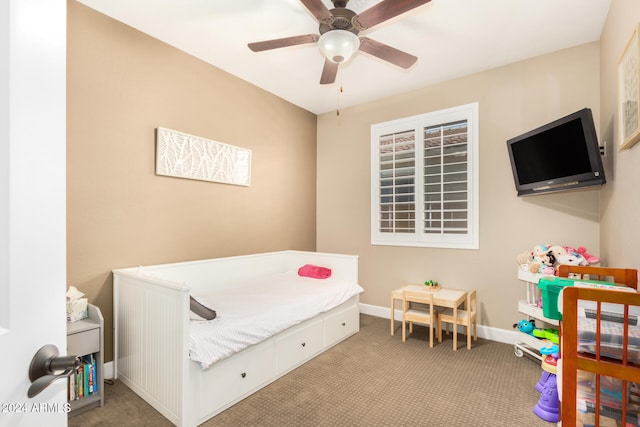 carpeted bedroom with ceiling fan