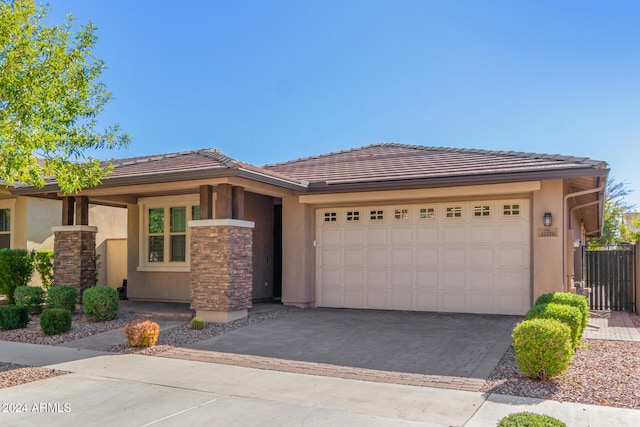 view of front of home with a garage