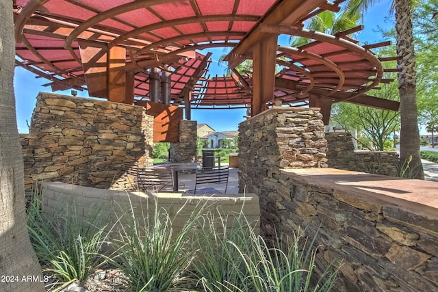 view of patio featuring a pergola