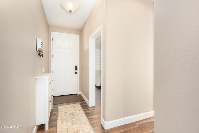 doorway to outside with hardwood / wood-style floors