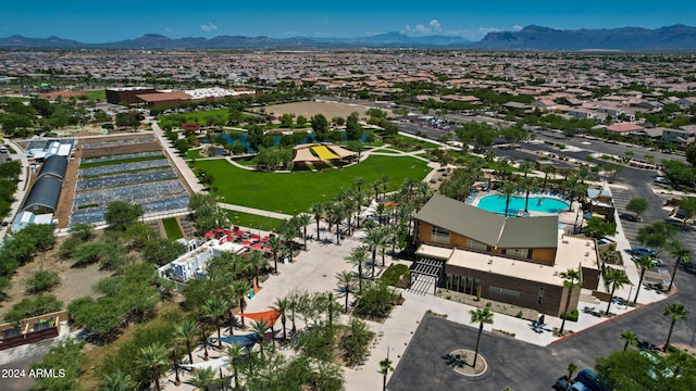 birds eye view of property featuring a mountain view