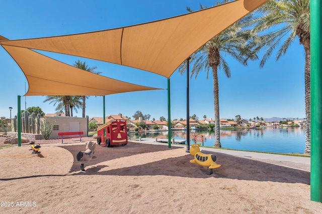 view of play area with a water view