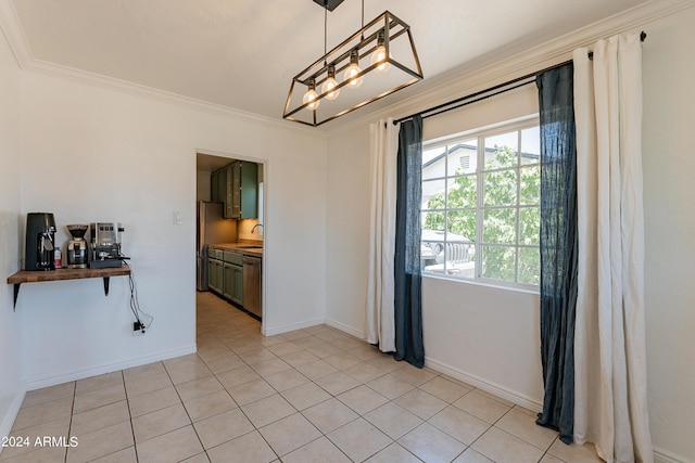 tiled dining room with crown molding and sink