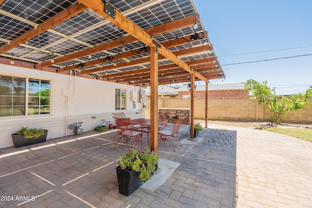 view of patio featuring a pergola