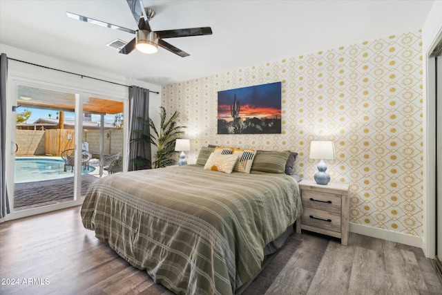 bedroom with dark wood-type flooring, ceiling fan, and access to outside