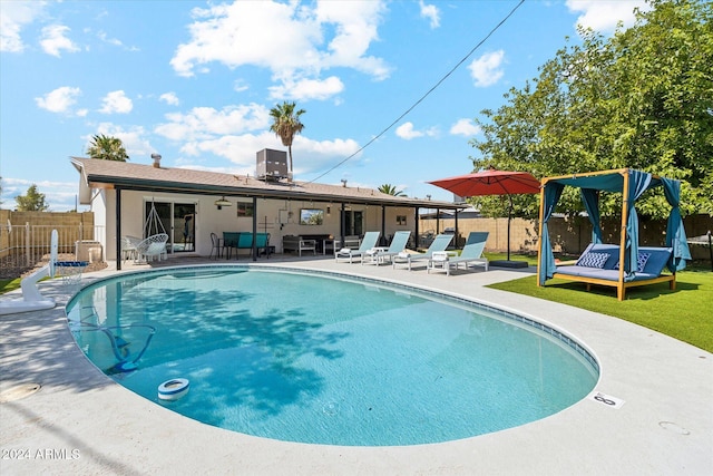 view of swimming pool with a patio area