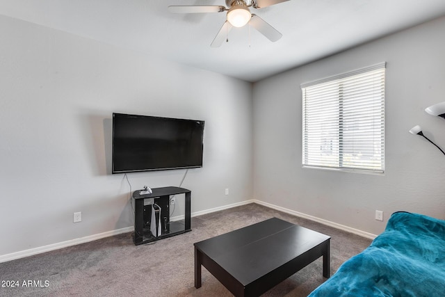 living room with carpet floors and ceiling fan