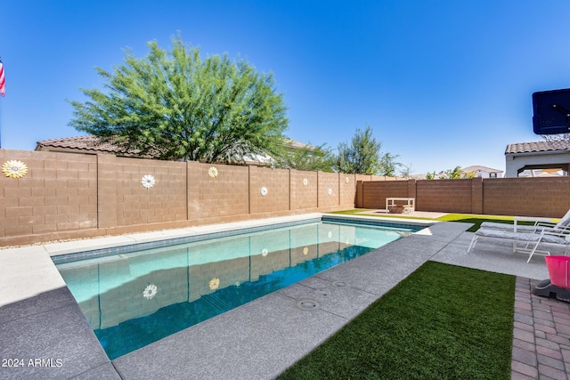 view of pool featuring a patio