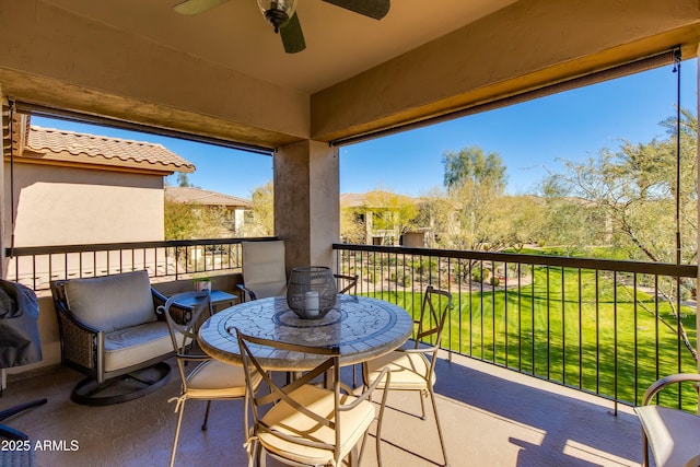 balcony featuring ceiling fan