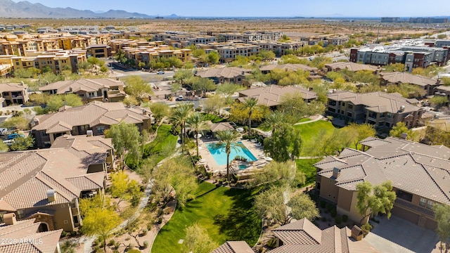 birds eye view of property featuring a mountain view