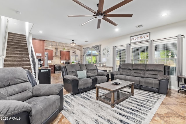 living room featuring stairs, recessed lighting, visible vents, and ceiling fan