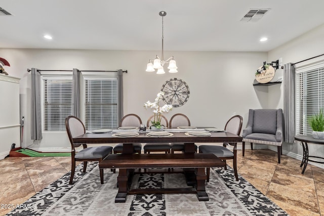 dining area featuring recessed lighting, baseboards, visible vents, and a chandelier