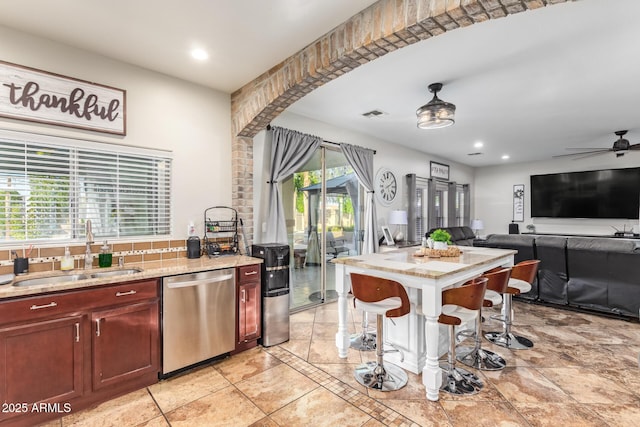 kitchen featuring visible vents, recessed lighting, ceiling fan, a sink, and stainless steel dishwasher