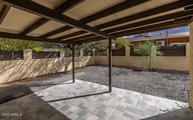 view of patio featuring fence private yard