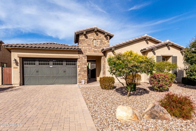 view of front of home with a garage