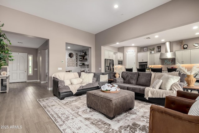 living room with hardwood / wood-style flooring