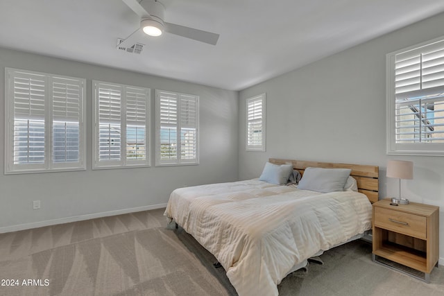 bedroom featuring ceiling fan and carpet floors