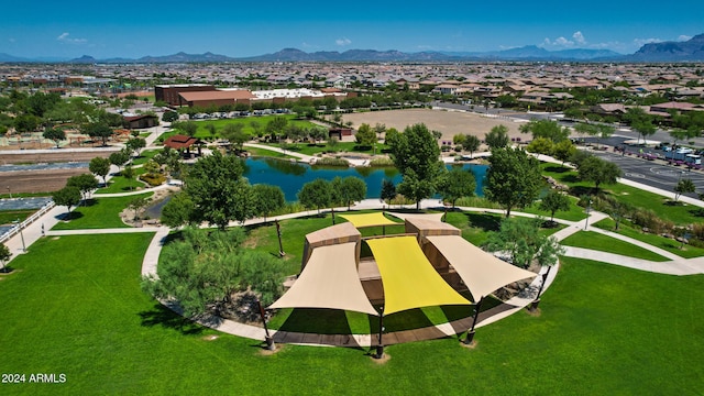 birds eye view of property featuring a water and mountain view