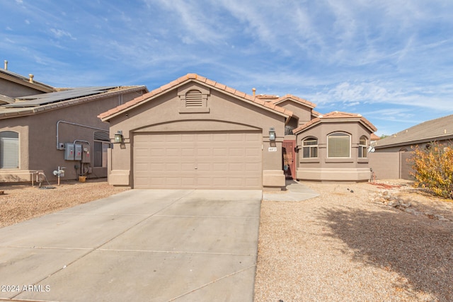 view of front of house with a garage